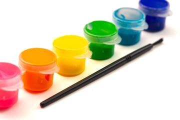 A Set of Childrens Rainbow Paint Isolated on a White Background