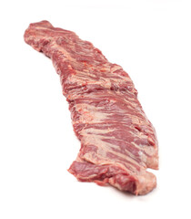 A Long Thin Raw Beef Flank Steak Isolated on a White Background