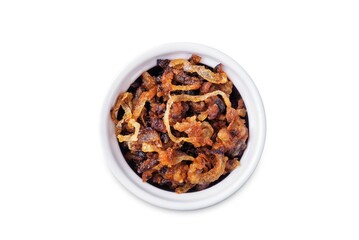 Caramelized onion in a bowl on a white isolated background