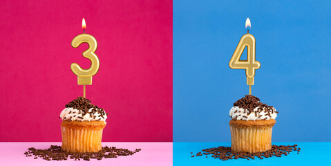 Two birthday cupcakes with the number 3 and 4 - Blue and pink background