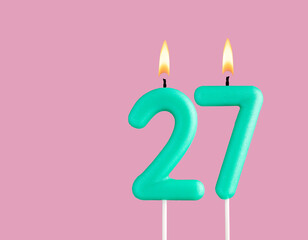 Green candle number 27 - Birthday card on pastel pink background