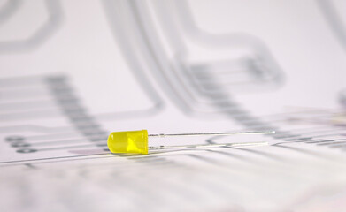 Single yellow Light Emitting Diode (led) on the electronic circuit diagram. Semiconductors and...