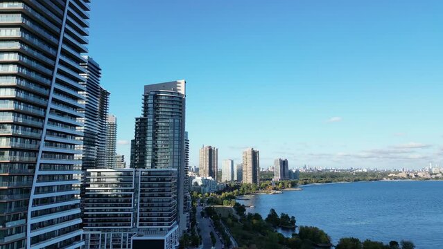 Aerial drone footage of highrise buildings in Humber Bay Etobicoke Toronto Canada on a sunny day with blue sky