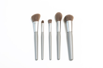 Cosmetic Makeup Brush Set, Isolated On White Background. Natural Bristle, Hair. Top View, Flat Lay. Professional Makeup Foundation, Eyeshadow, Angled, Blush, Blending Powder Brushes. Horizontal