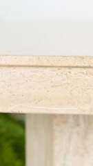 Vintage hexagonal stone dining table. Closeup detail photograph.