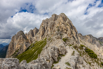 Dolomites beautiful mountain landscape on a sunny day. Hiking in the Alps in Italy, South Tirol mountain range of Alpi Dolomiti di Sesto near Cortina di Amprezzo and Tre Cime di Lavaredo alpine scene