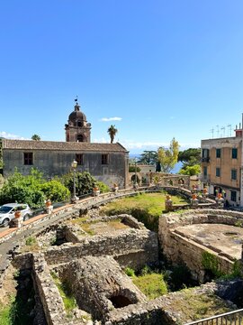 Photo of the Chiesa di San Pancrazio Catholic church and the archaeological site of Terma di Piazza San Pancrazio in Taormina, Sicily, Italy.