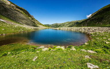 A glacial lake formed by the melting snow waters of the Altıparmak Mountains