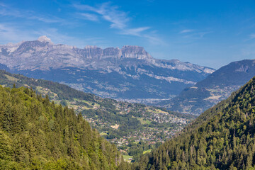 Chamonix Montblanc beautiful alpine mountain summits landscape. Alps mountains with snow and glacier above green valley of Chamonix in France. Alps beautiful scenery in summer