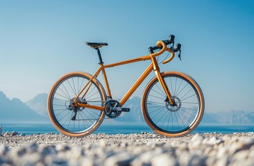 Fototapeta premium Yellow Bike Parked on Rocky Beach