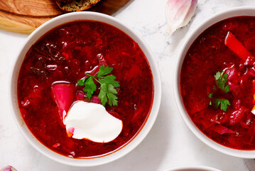 Ukrainian borscht with sour cream in bowls. top  view. .style hugge