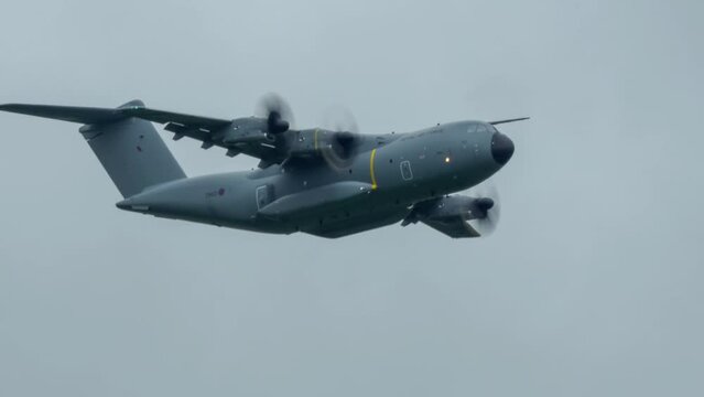 British Royal Air Force Airbus A400M Atlas military cargo plane on a low-level troop parachute drop exercise practise run