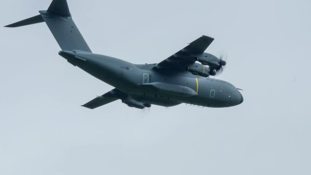British Royal Air Force Airbus A400M Atlas military cargo plane on a low-level troop parachute drop exercise practise run