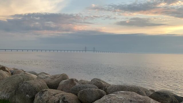 Oresund bridge, border between Sweden and Denmark, Bridge to Malmo, Bridge to Copenhagen, Sea, Summer sunset, Calm Seat, Nature sounds, sea waves, standing still