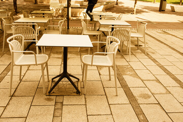 Restaurant outdoor terrace in city centre.Summer season. High quality photo