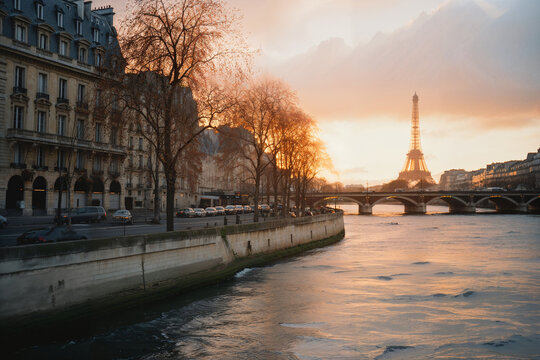 Paris cityscape at sunset with Eiffel Tower in the background. Generative AI image