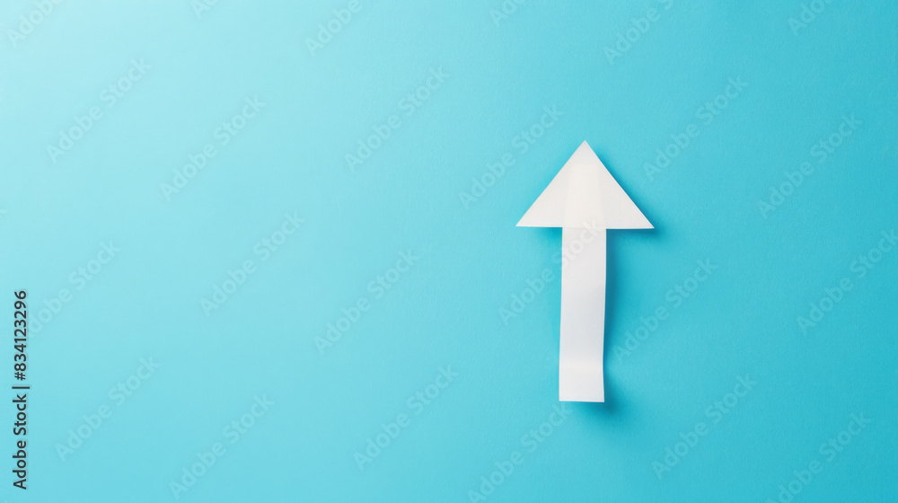 Poster white paper arrow on vibrant blue background with minimalist design pointing upward