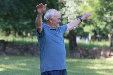 senior man exercising outdoors, doing sport