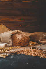 Freshly baked homemade bread and ears of wheat