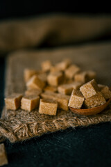 brown sugar heap and wooden spoon