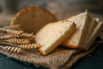 Freshly baked homemade bread and ears of wheat