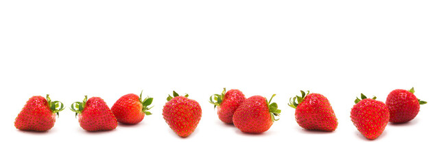 Fresh organic ripe strawberries scattered isolated on a white background. Background for spring...