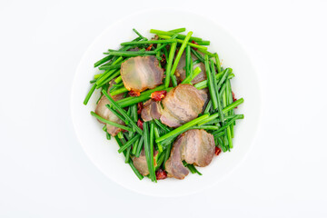 A dish of fried leek moss with bacon