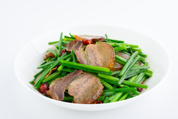 A dish of fried leek moss with bacon