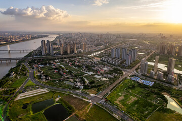 Obraz premium Aerial photography of the urban center on both sides of the Xiangjiang River in Xiangtan, China