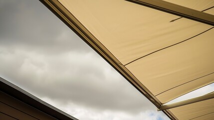 Obraz premium Retail building awning close-up, macro shot of fabric texture, no people, overcast sky, sheltering shoppers.
