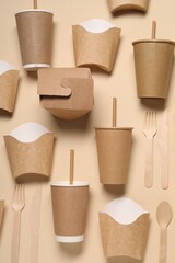 Flat lay composition with eco friendly food packagings on beige background