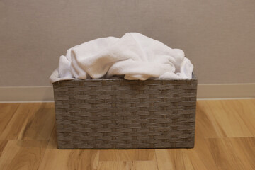 Used towel in laundry basket