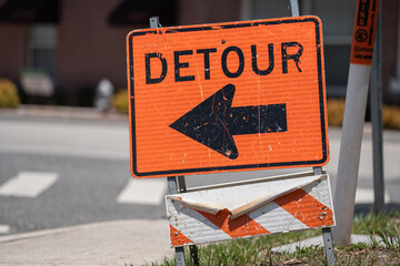 Orange Detour Sign Downtown For Traffic And Construction Sites