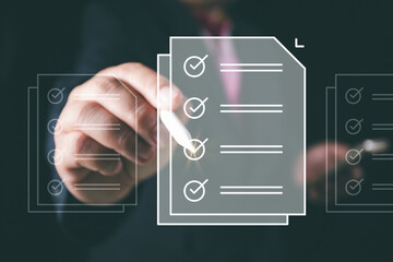 Business performance checklist, businessman using pen doing online checklist survey, filling out digital form checklist, take an assessment, questionnaire, evaluation, online survey, online exam.