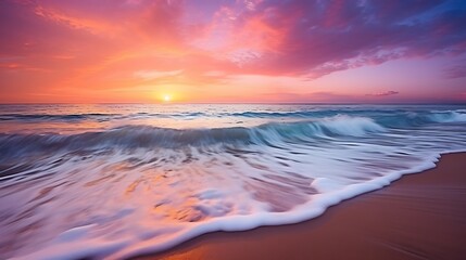 Obraz premium Colorful sunset viewed from the pink sea beach with soft waves