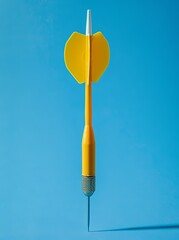 Darts, a yellow dart with a white ring on a blue background and a target in the style of a business goal concept