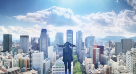 Fototapeta premium 日本の街・都市・朝日を受けたオフィスビル群を前に佇み風を受けて髪をなびかせる会社員の女性の出勤 ビジネス・はじまり・決意・目標・挑戦のイメージ