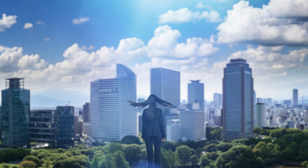 日本の街・都市・朝日を受けたオフィスビル群を前に佇み風を受けて髪をなびかせる会社員の女性の出勤　ビジネス・はじまり・決意・目標・挑戦のイメージ