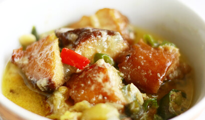 Mangut of smoked stingray or smoked fish in a spicy and creamy sauce. Mangut ikan pari. Indonesian food.