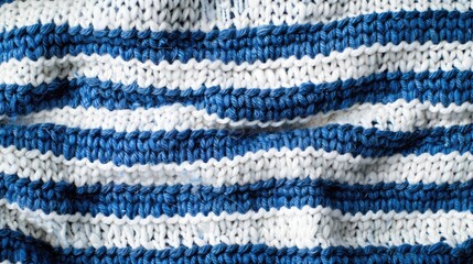 Blue and white striped pattern on knitted fabric