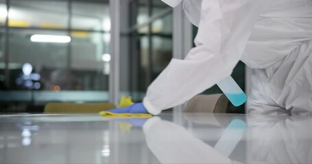 Ppe, disinfectant and hand of person with spray in lab for germs, virus exposure or prevent infection. Biohazard, cleaning and hygiene worker in hazmat suit for decontamination, chemical or sanitize - Powered by Adobe