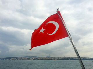 The national flag of Turkey, officially the Turkish flag is a red flag featuring a white star and crescent.