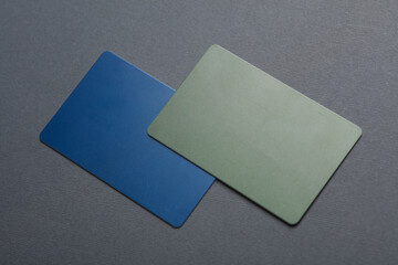 Plastic credit cards on dark gray background close up