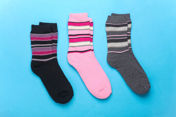 Colored socks on a blue background