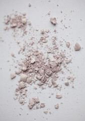 Makeup powder on a white background close up