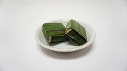 Lemper, a traditional snack from Indonesia, made from sticky rice, steamed with coconut milk,...