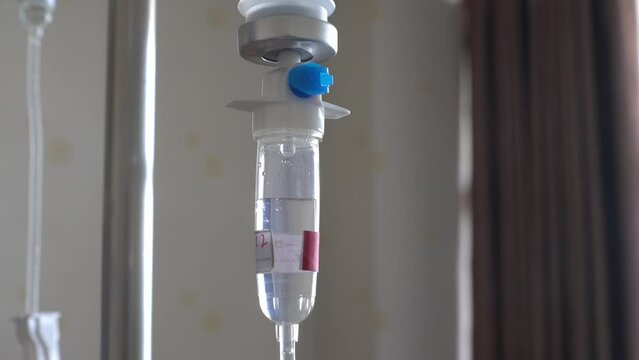 Close up set saline IV bag infusion drip for patient in hospital, Concept life insurance business, medical and healthcare technology.