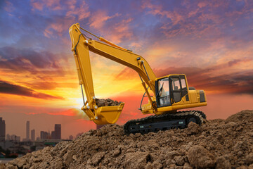 Crawler Excavators with are digging the soil in the construction site on the sunset backgrounds