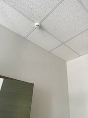 Fire safety system sensor. Fire safety system on the ceiling.