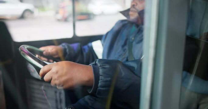 Bus, driver and driving on road for transportation or commute passengers, trip and journey for public transit. Black man, steering wheel and control of vehicle for safety, route and motion for travel